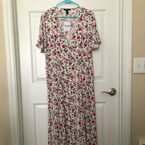 Floor length flowered dress.